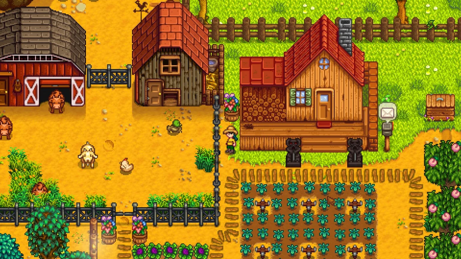 Une ferme de Stardew Valley vue du dessus, la grange, la maison et les parcelles cultivées côte à côte